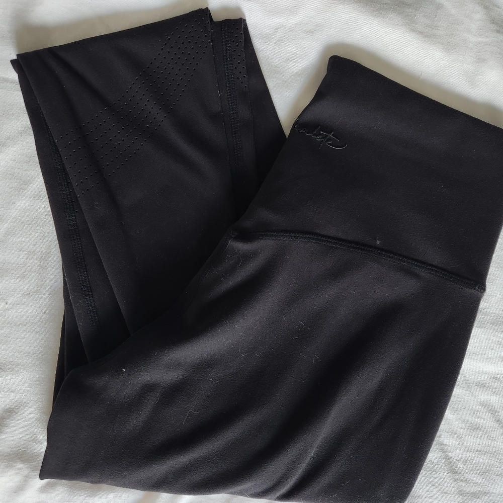 Alphalete Cross Front Wrap Cutout Leggings